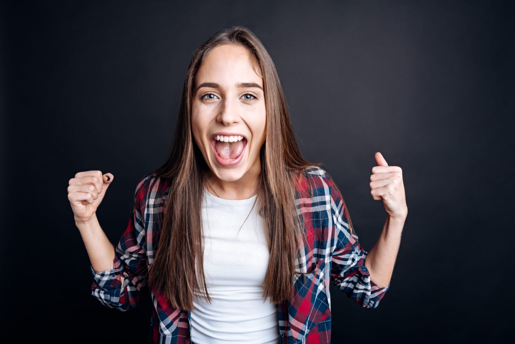 Cheerful woman expressing joy Rogers TMJ Treatment
